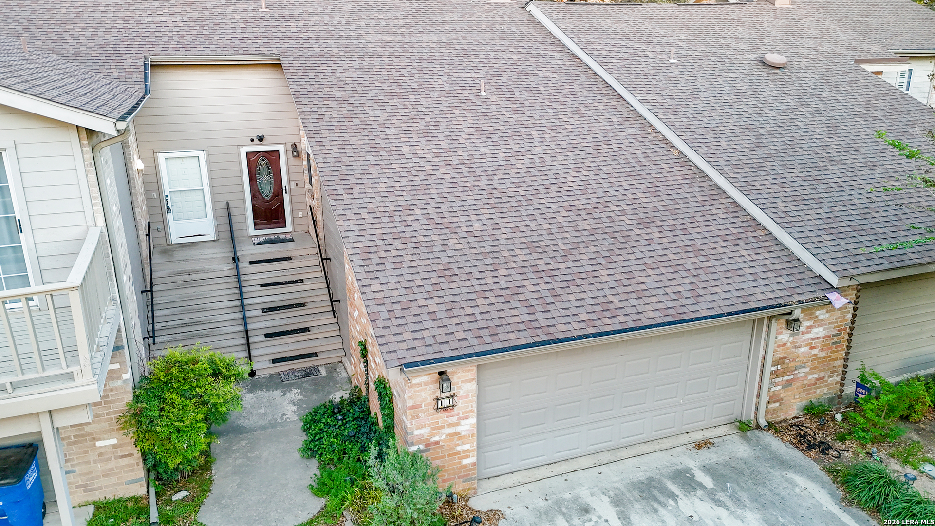14 Oak Villa Road, Unit G5 Canyon Lake, TX 78133 - Photo 3 of 27 a brick building with a large windows