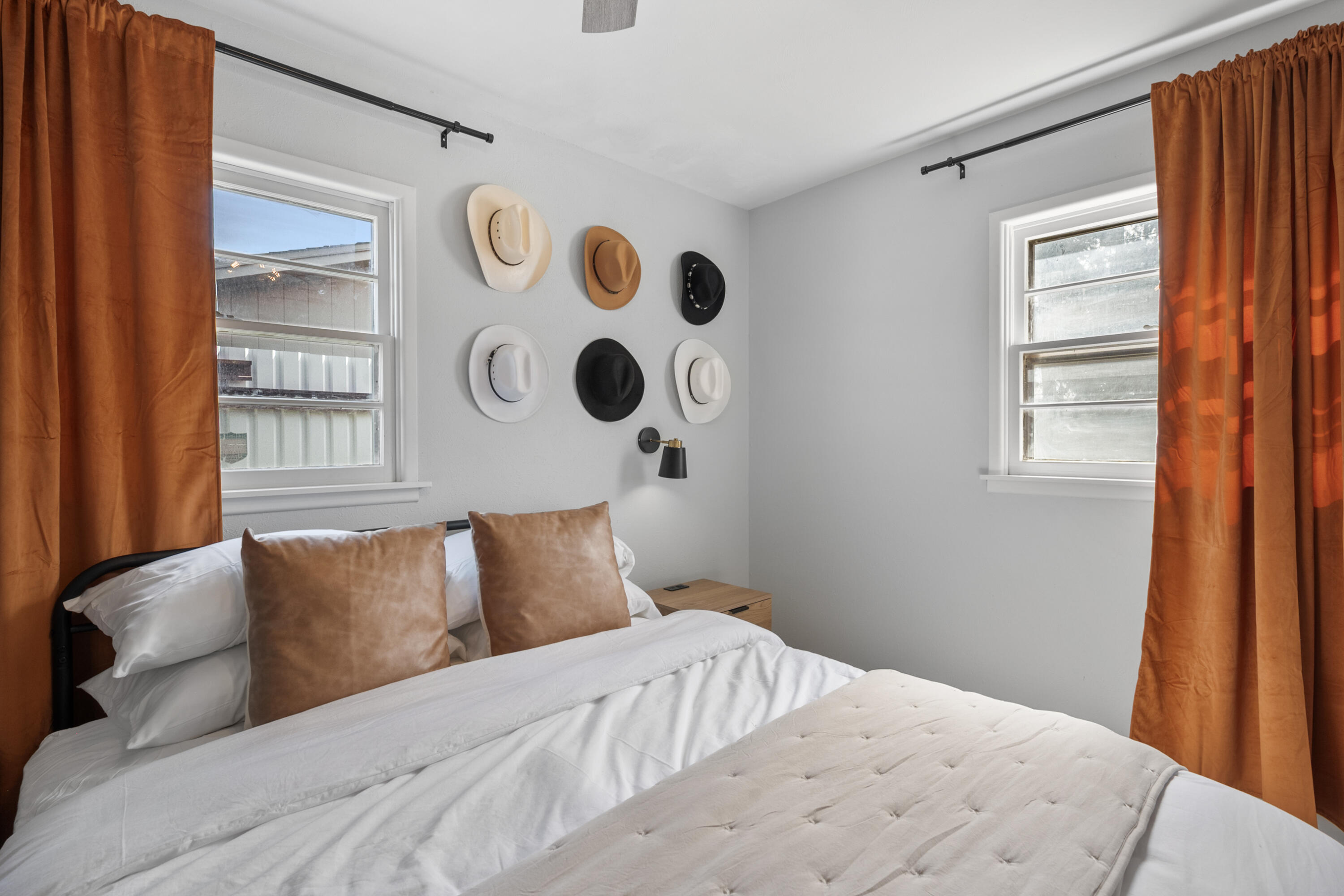 5421 43rd Street Lubbock, TX 79414 - Photo 17 of 40 a bedroom with a bed and wooden floor