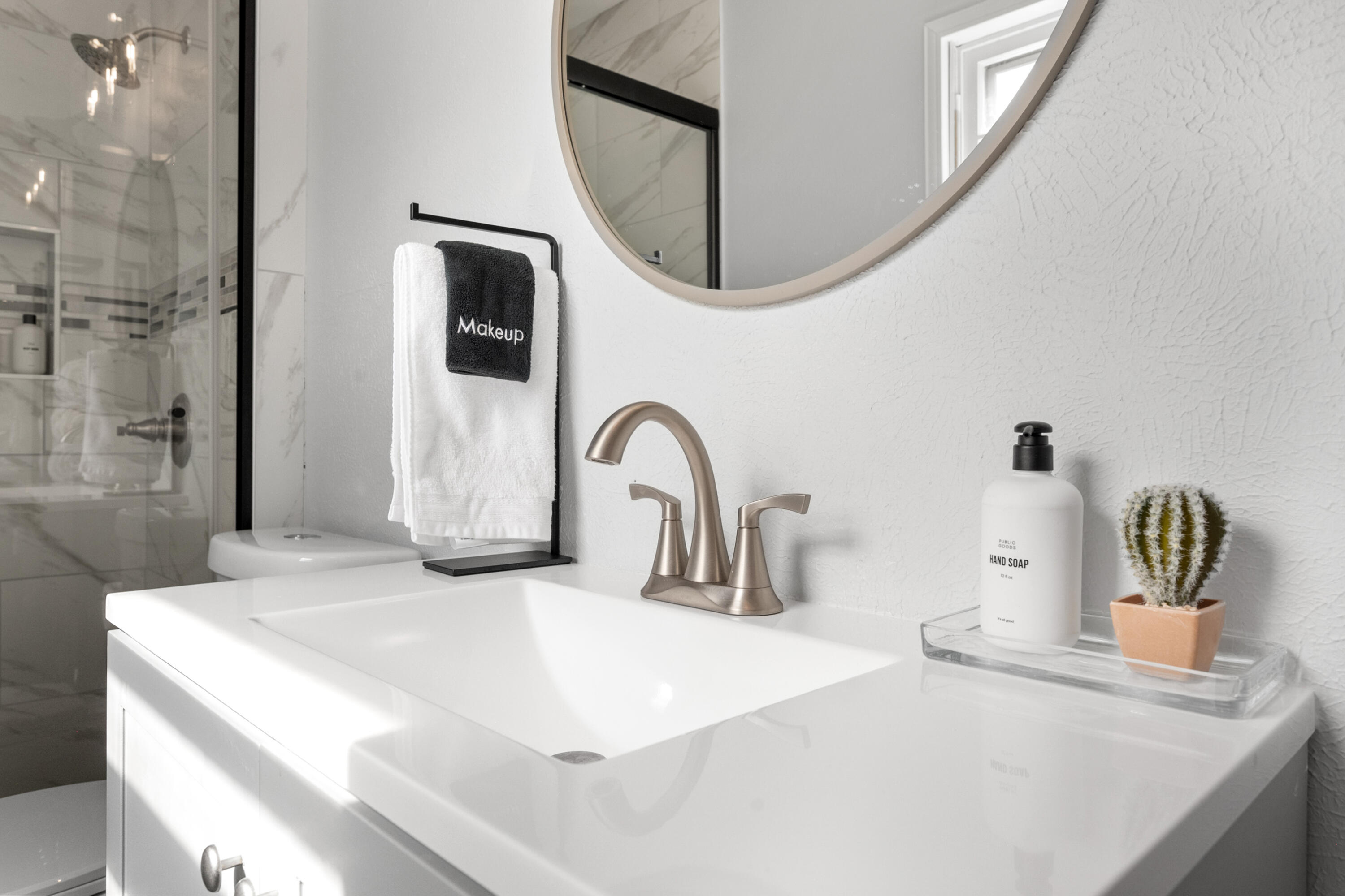 5421 43rd Street Lubbock, TX 79414 - Photo 21 of 40 a bathroom with a sink and a mirror