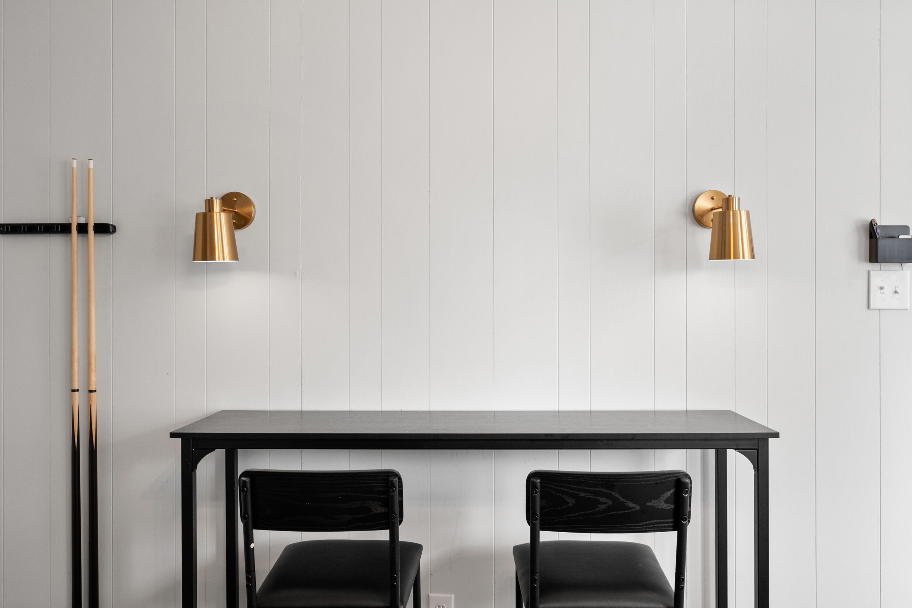 5421 43rd Street Lubbock, TX 79414 - Photo 36 of 40 a cabinet with two chairs and a table