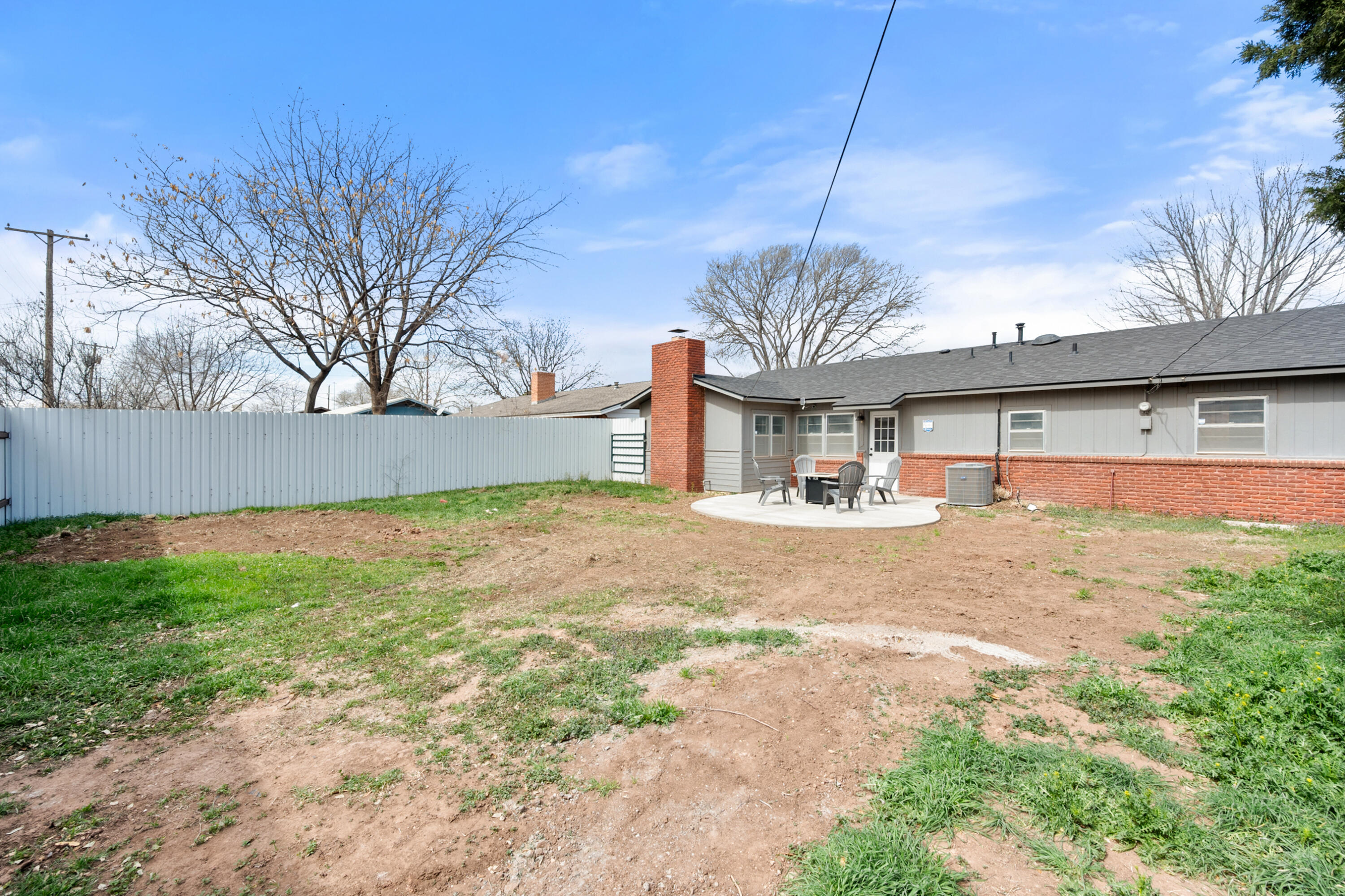 5421 43rd Street Lubbock, TX 79414 - Photo 38 of 40 a view of a house with a backyard