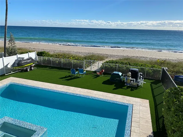 a view of a garden with an outdoor space