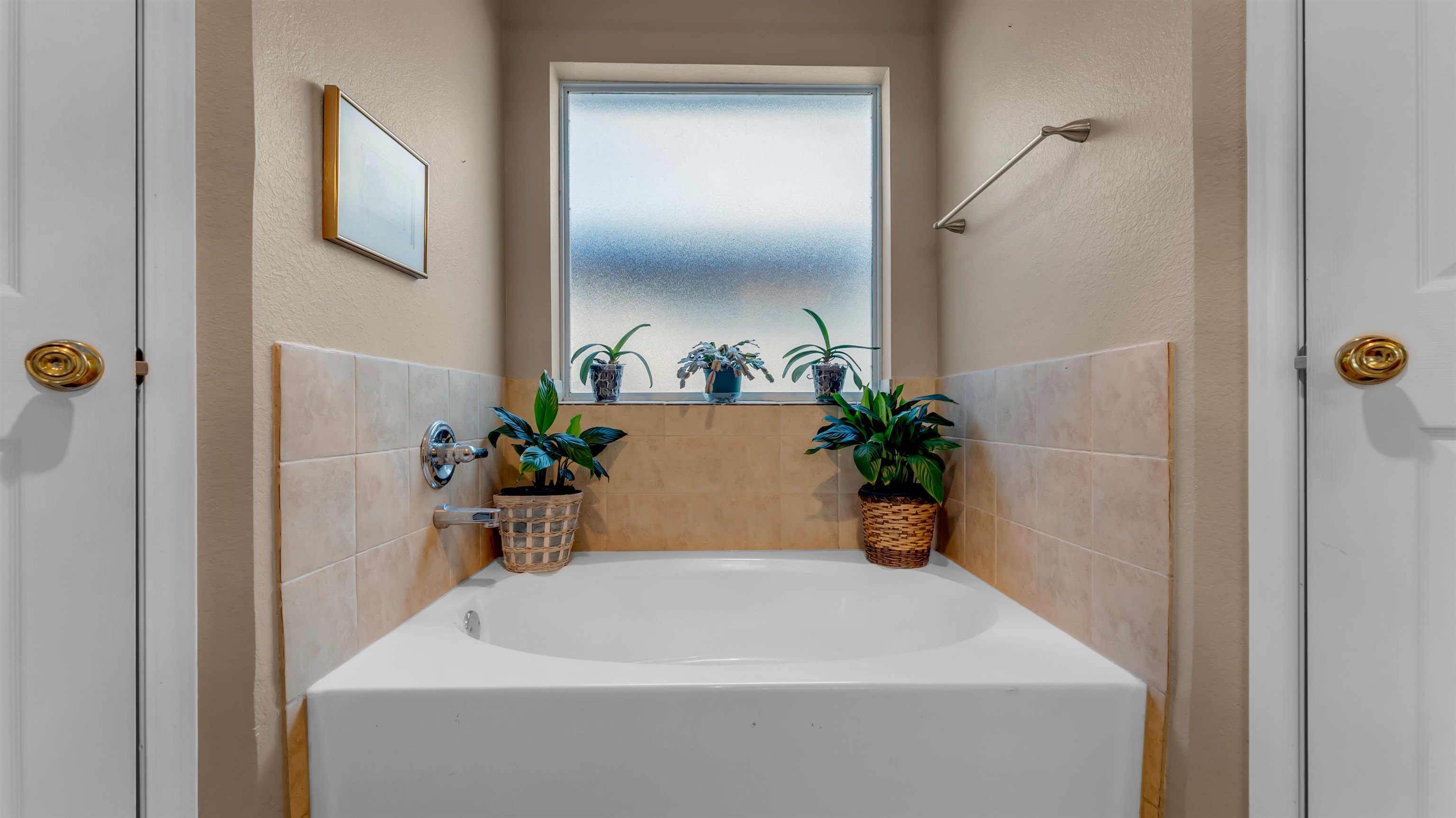 1004 East Johnson Street Burnet, TX 78611 - Photo 12 of 23 a white bath tub sitting next to a white tub
