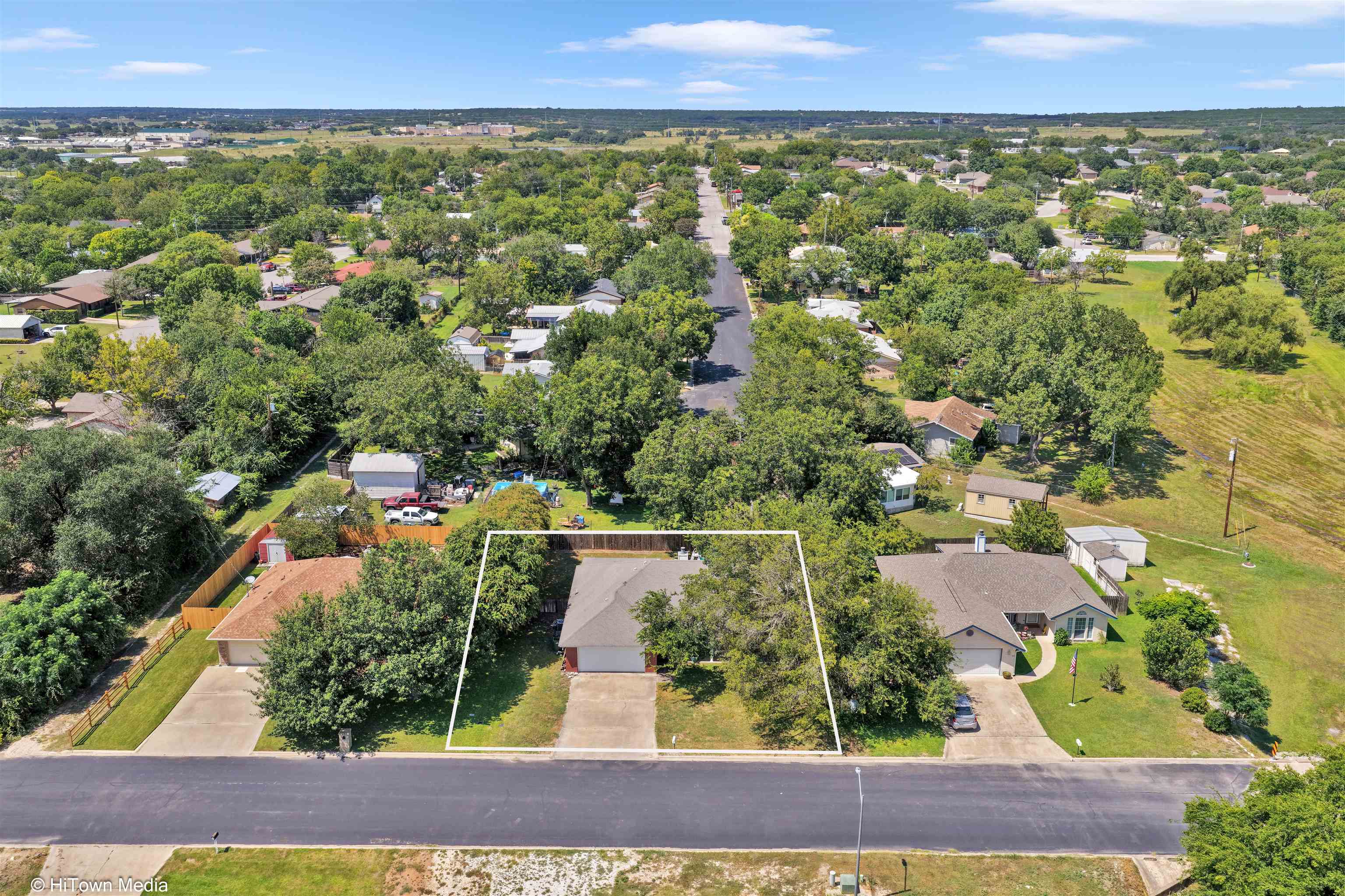 1004 East Johnson Street Burnet, TX 78611 - Photo 19 of 23 an aerial view of a house with a garden