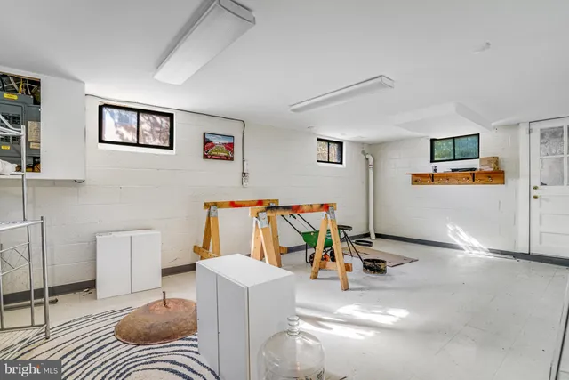 a bedroom with furniture and a couch