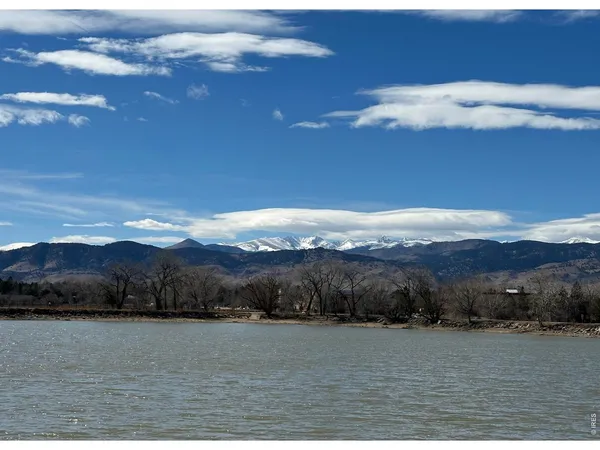 a view of mountain and an ocean