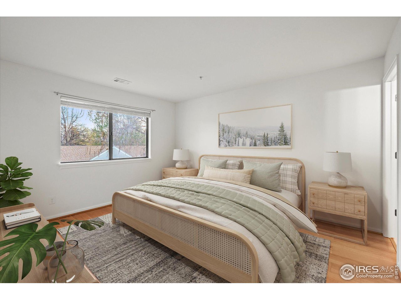 4945 Twin Lakes Road, Unit 39 Boulder, CO 80301 - Photo 10 of 24 Virtually staged primary bedroom accommodates a king-sized bed.
