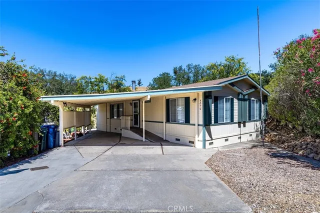 a view of a livingroom with furniture and wooden floor