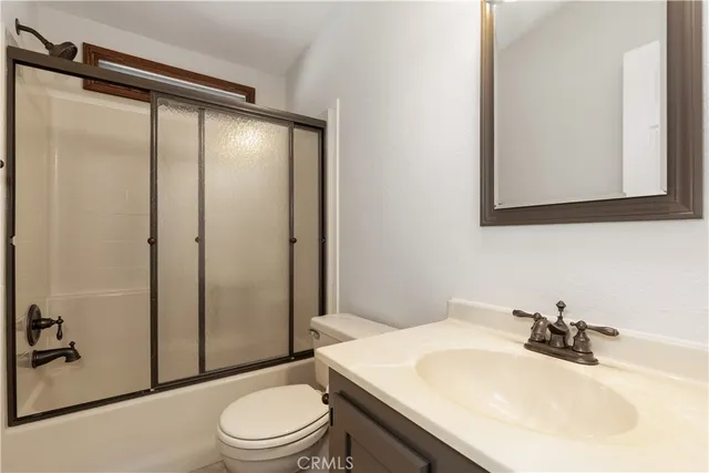 a view of an empty room with a balcony