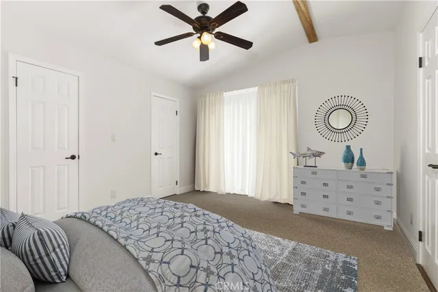 a view of a room with wooden floor and balcony