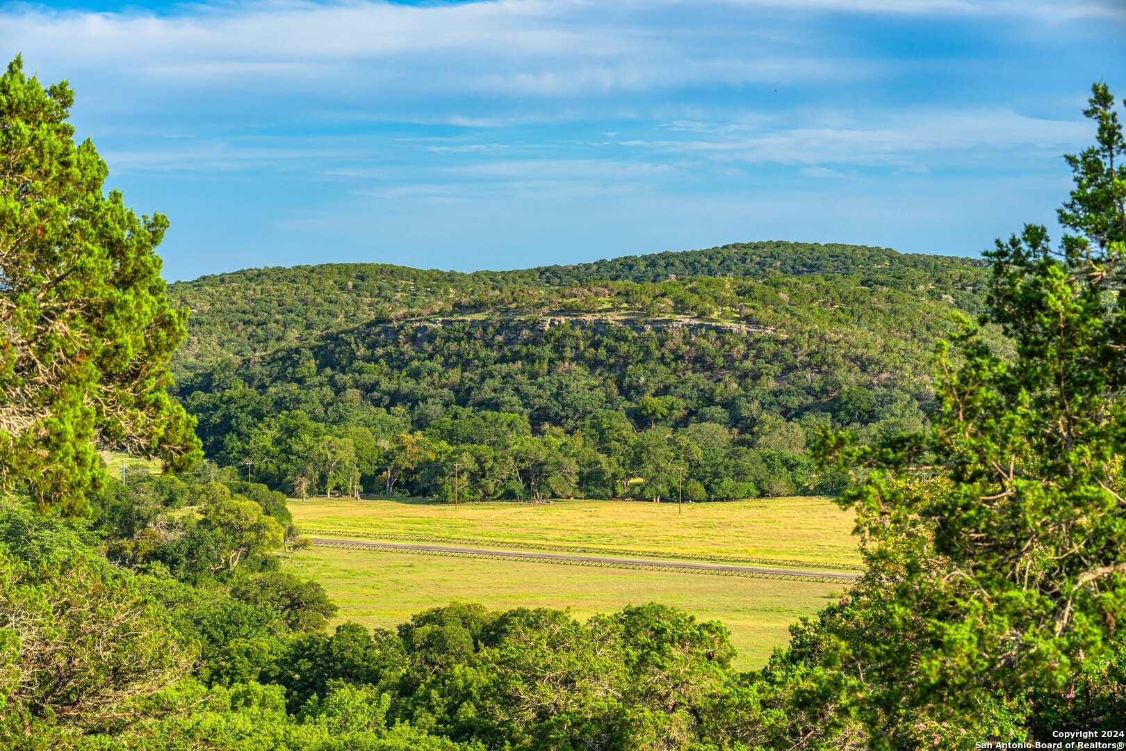 240 River Bend Road West Hunt, TX 78024 - Photo 25 of 45 a view of a yard with an outdoor space