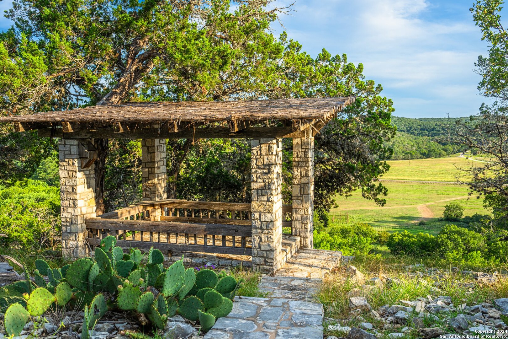 240 River Bend Road West Hunt, TX 78024 - Photo 39 of 45 a sign that is sitting in front of a house with a big yard