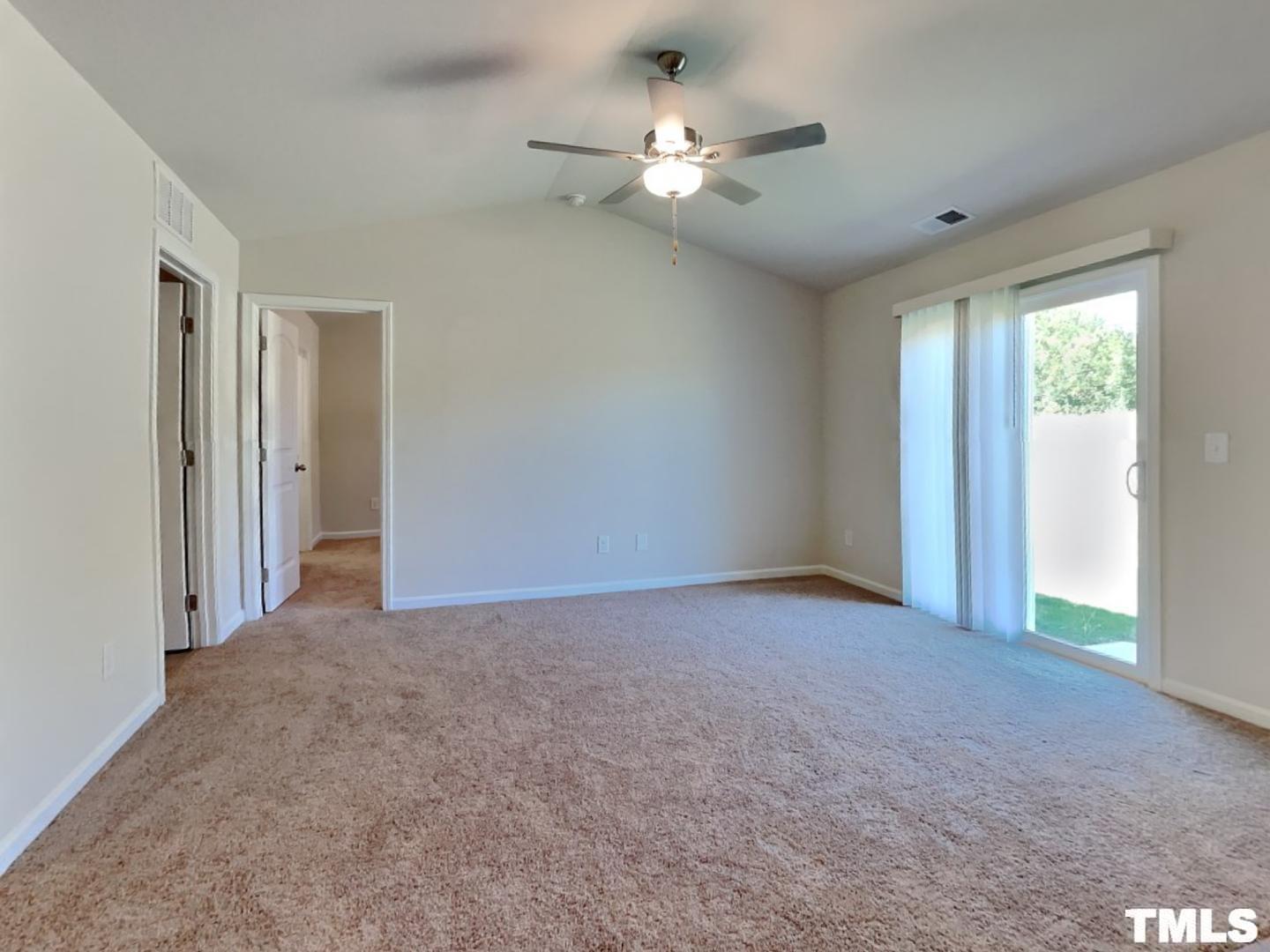 175 Coleshill Road Angier, NC 27501 - Photo 2 of 16 a view of an empty room with a window