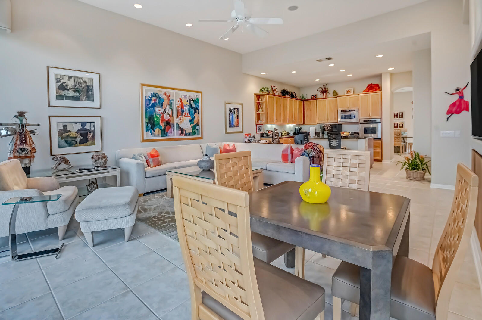 128 Loch Lomond Road Rancho Mirage, CA 92270 - Photo 16 of 42 a living room with dining table and chairs