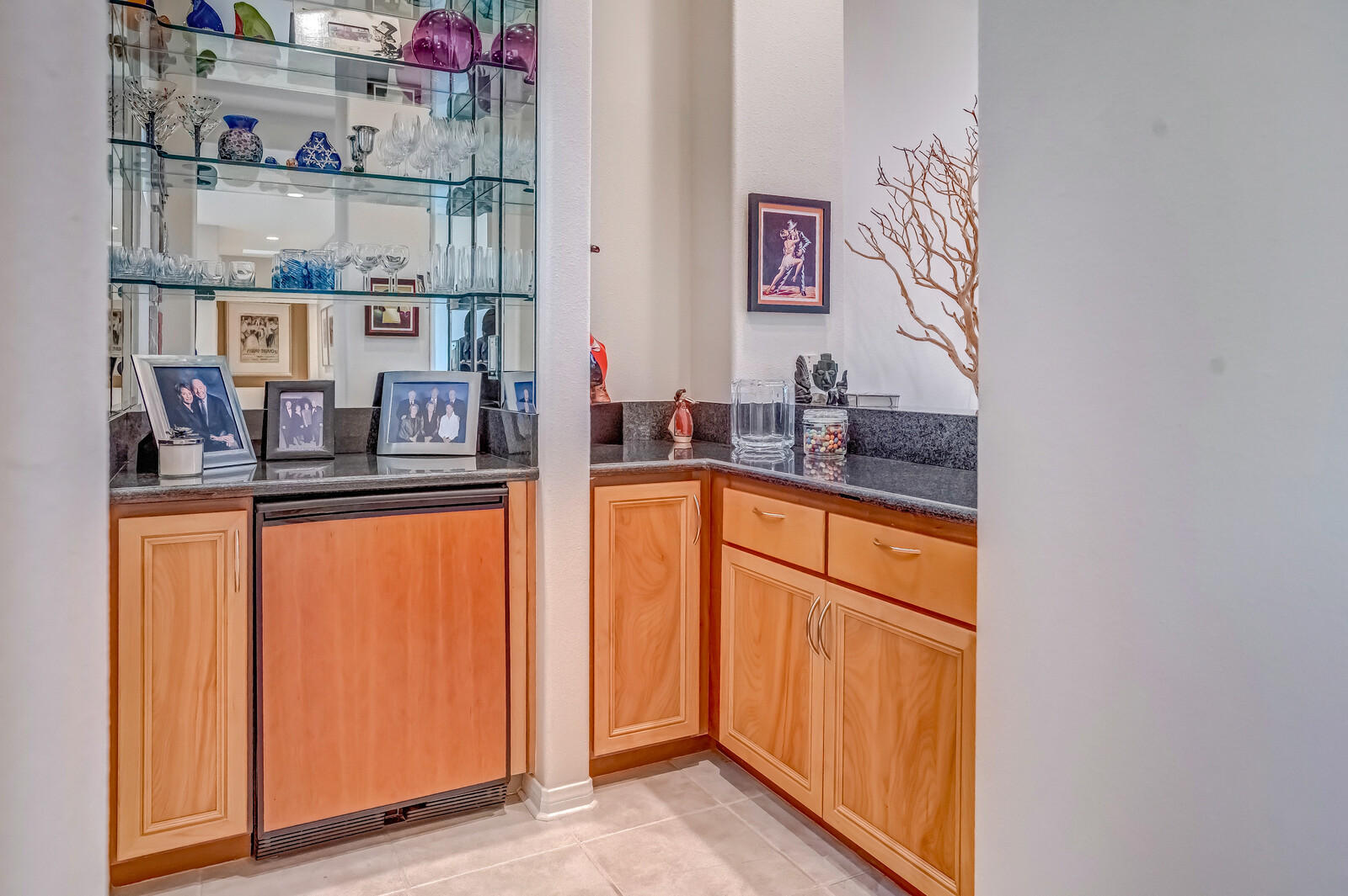 128 Loch Lomond Road Rancho Mirage, CA 92270 - Photo 17 of 42 a kitchen with stainless steel appliances granite countertop a refrigerator and a sink