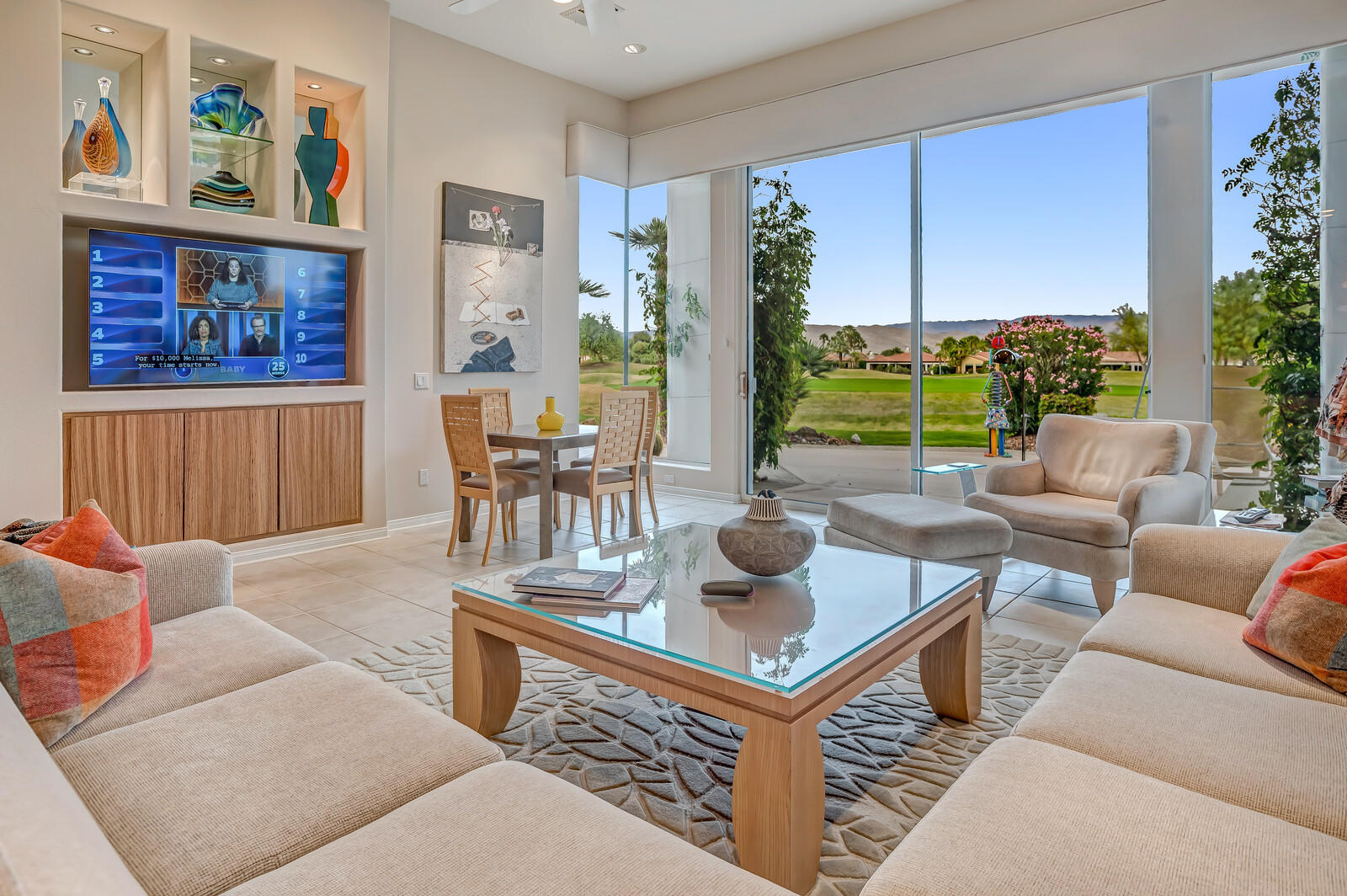 128 Loch Lomond Road Rancho Mirage, CA 92270 - Photo 20 of 42 a living room with furniture and large window
