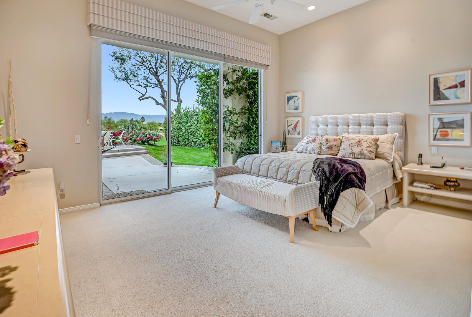 128 Loch Lomond Road Rancho Mirage, CA 92270 - Photo 21 of 42 a bed room with a bed and a couch
