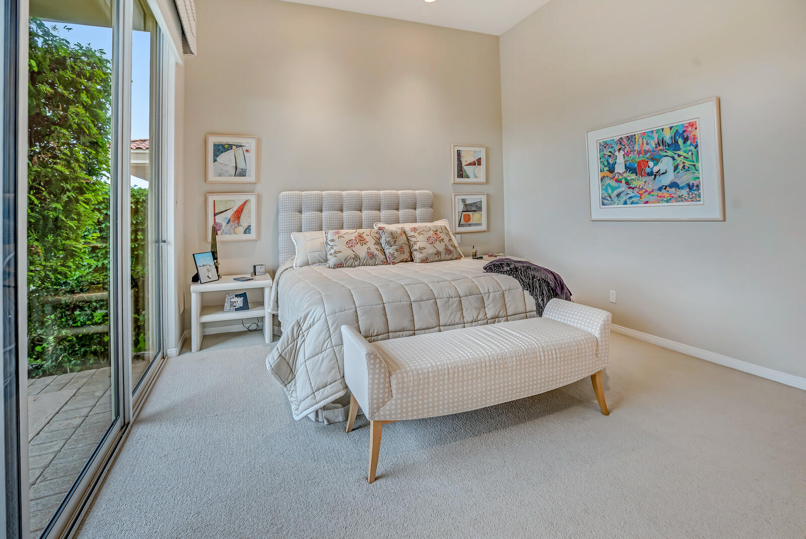 128 Loch Lomond Road Rancho Mirage, CA 92270 - Photo 23 of 42 a bedroom with a bed painting and a large window