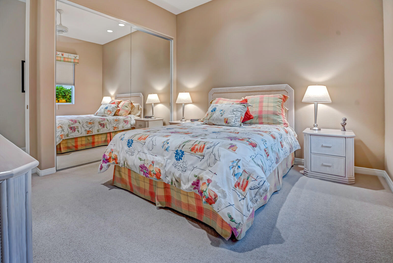 128 Loch Lomond Road Rancho Mirage, CA 92270 - Photo 28 of 42 a bedroom with a bed and a night stand