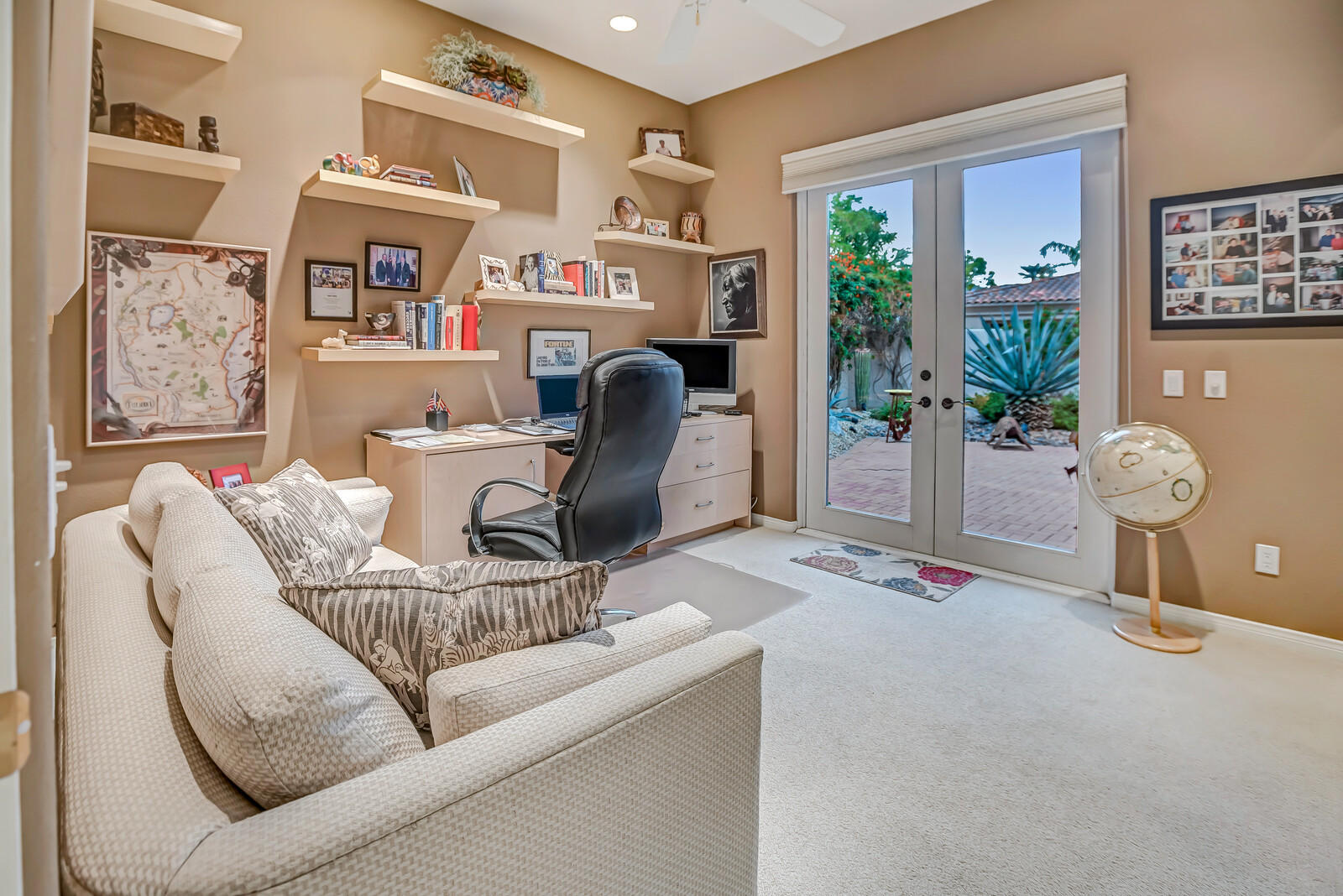 128 Loch Lomond Road Rancho Mirage, CA 92270 - Photo 32 of 42 a living room with furniture and a large window