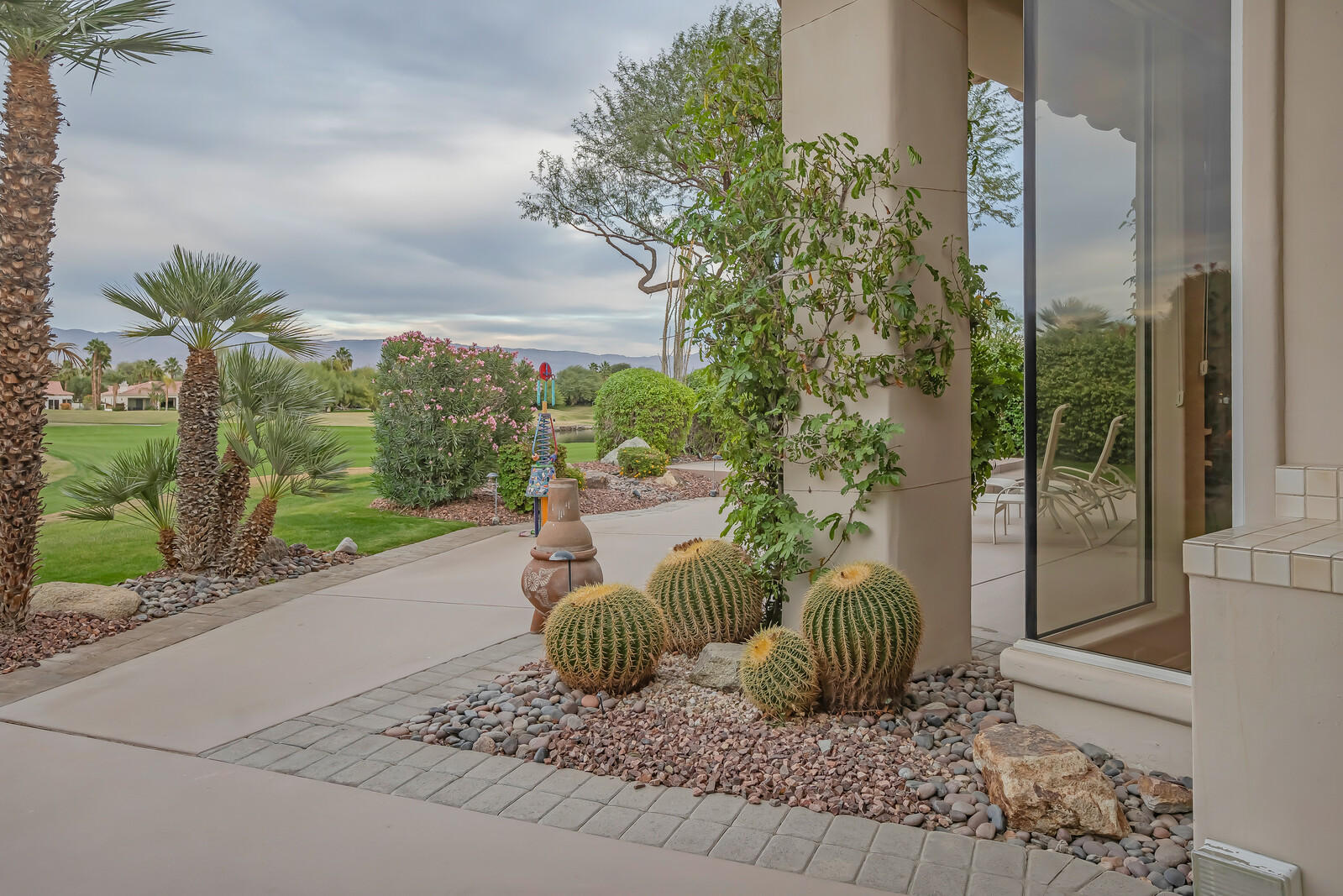 128 Loch Lomond Road Rancho Mirage, CA 92270 - Photo 37 of 42 a view of a garden from a living room