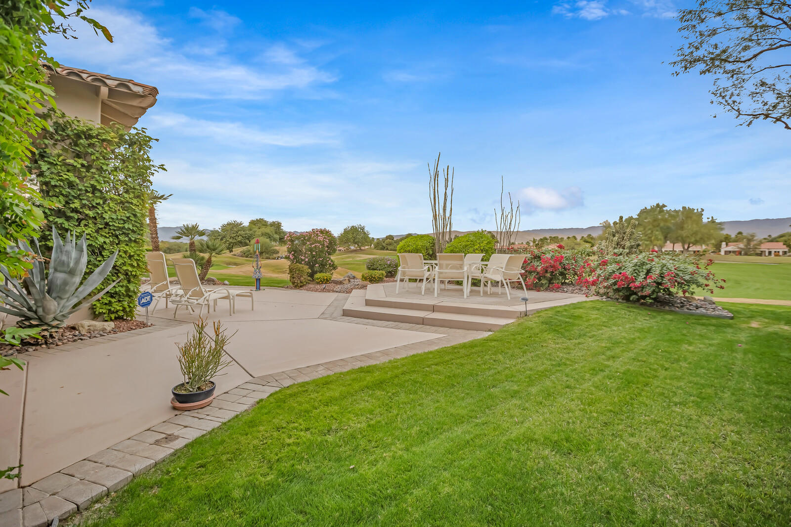 128 Loch Lomond Road Rancho Mirage, CA 92270 - Photo 42 of 42 a view of a garden with an ocean