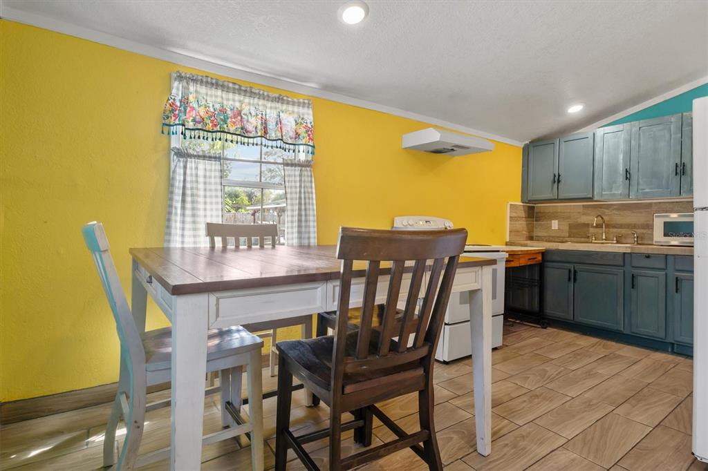 513 5th Street South Dundee, FL 33838 - Photo 16 of 29 a view of a dining room with furniture and a window