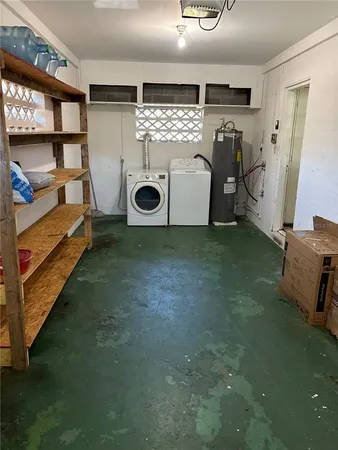 a storage room with washer and dryer