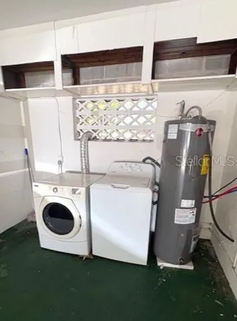 a utility room with dryer and washer