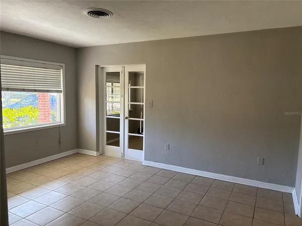 an empty room with windows