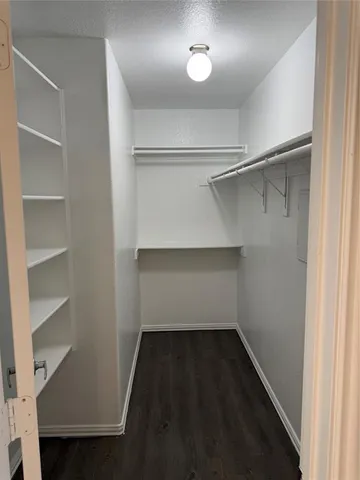 a white toilet sitting next to a window