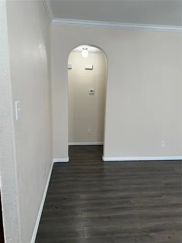 a view of a livingroom with wooden floor