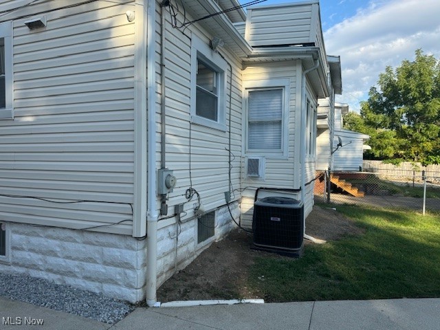 18210 Windward Road Cleveland, OH 44119 - Photo 37 of 40 View of side of home with central air condition unit