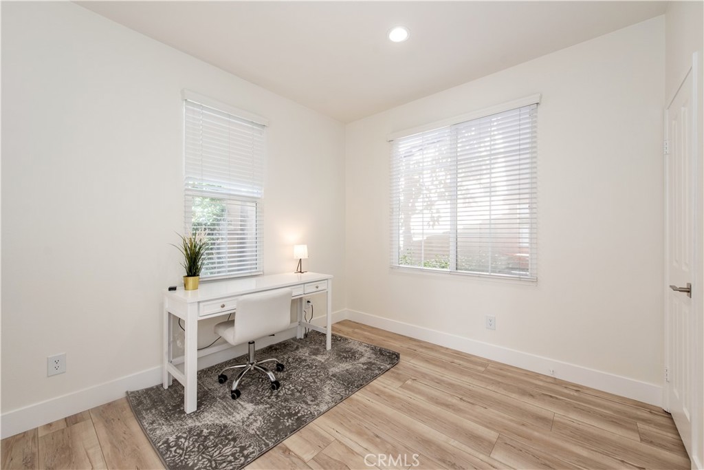94 Chantilly Irvine, CA 92620 - Photo 11 of 30 a room with a window a desk and chair
