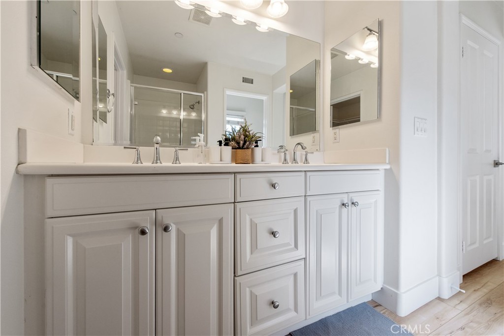 94 Chantilly Irvine, CA 92620 - Photo 17 of 30 a kitchen with white cabinets and sink