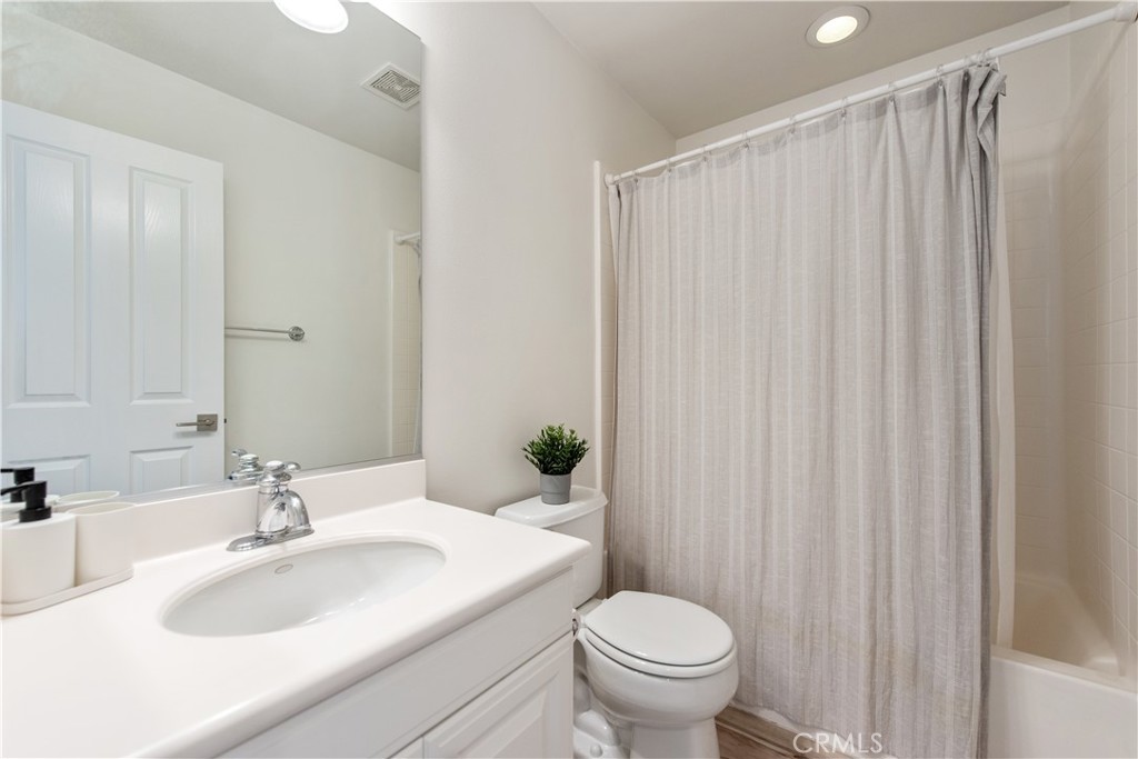 94 Chantilly Irvine, CA 92620 - Photo 20 of 30 a bathroom with a sink and toilet