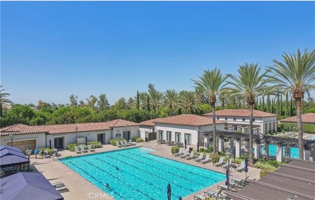 94 Chantilly Irvine, CA 92620 - Photo 26 of 30 a front view of a house with garden and trees
