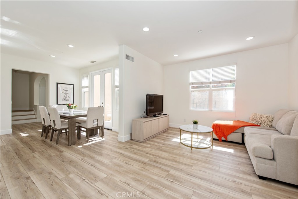 94 Chantilly Irvine, CA 92620 - Photo 3 of 30 a living room with furniture and a flat screen tv