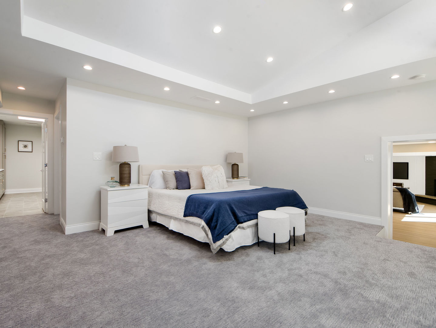 4343 Davis Street Skokie, IL 60076 - Photo 16 of 41 a spacious bedroom with a bed and a view of living room
