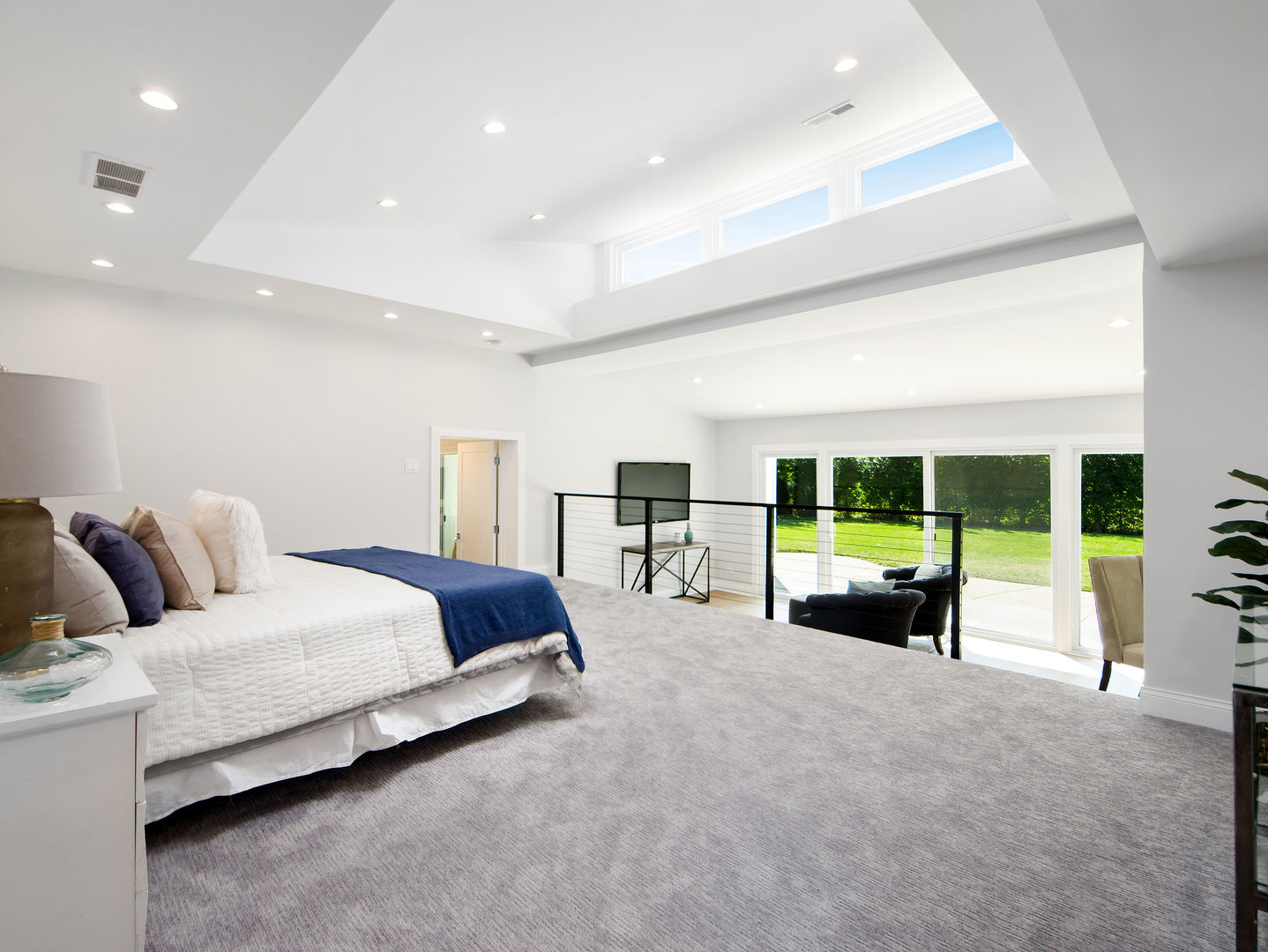 4343 Davis Street Skokie, IL 60076 - Photo 17 of 41 a living room with a bed and a large window