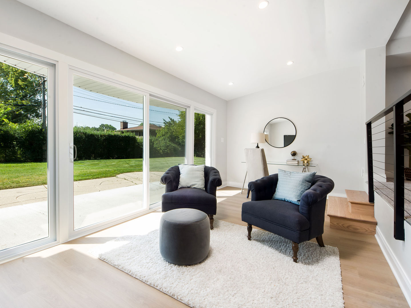 4343 Davis Street Skokie, IL 60076 - Photo 19 of 41 a living room with furniture and large windows