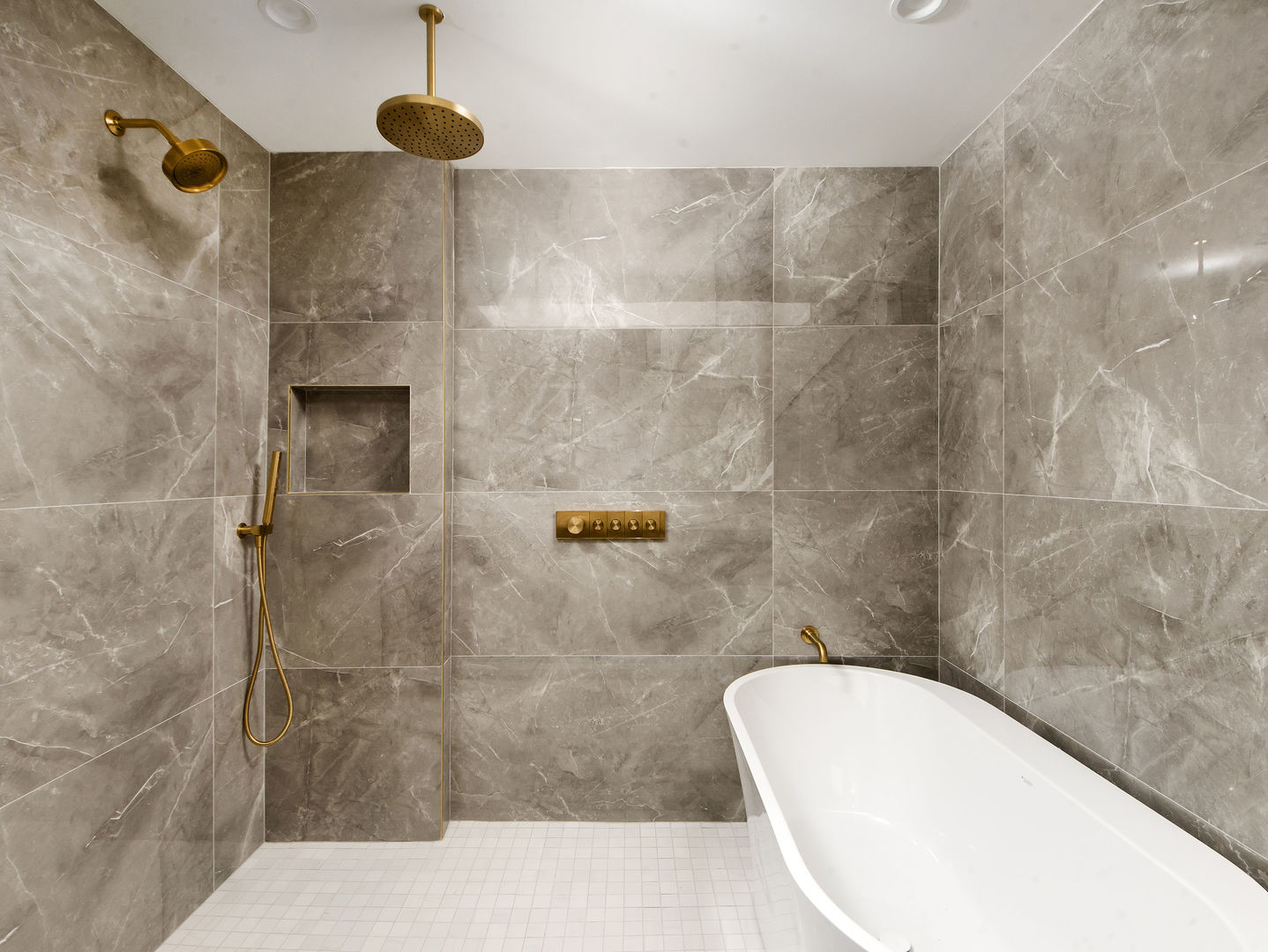 4343 Davis Street Skokie, IL 60076 - Photo 23 of 41 a bathroom with a white bath tub