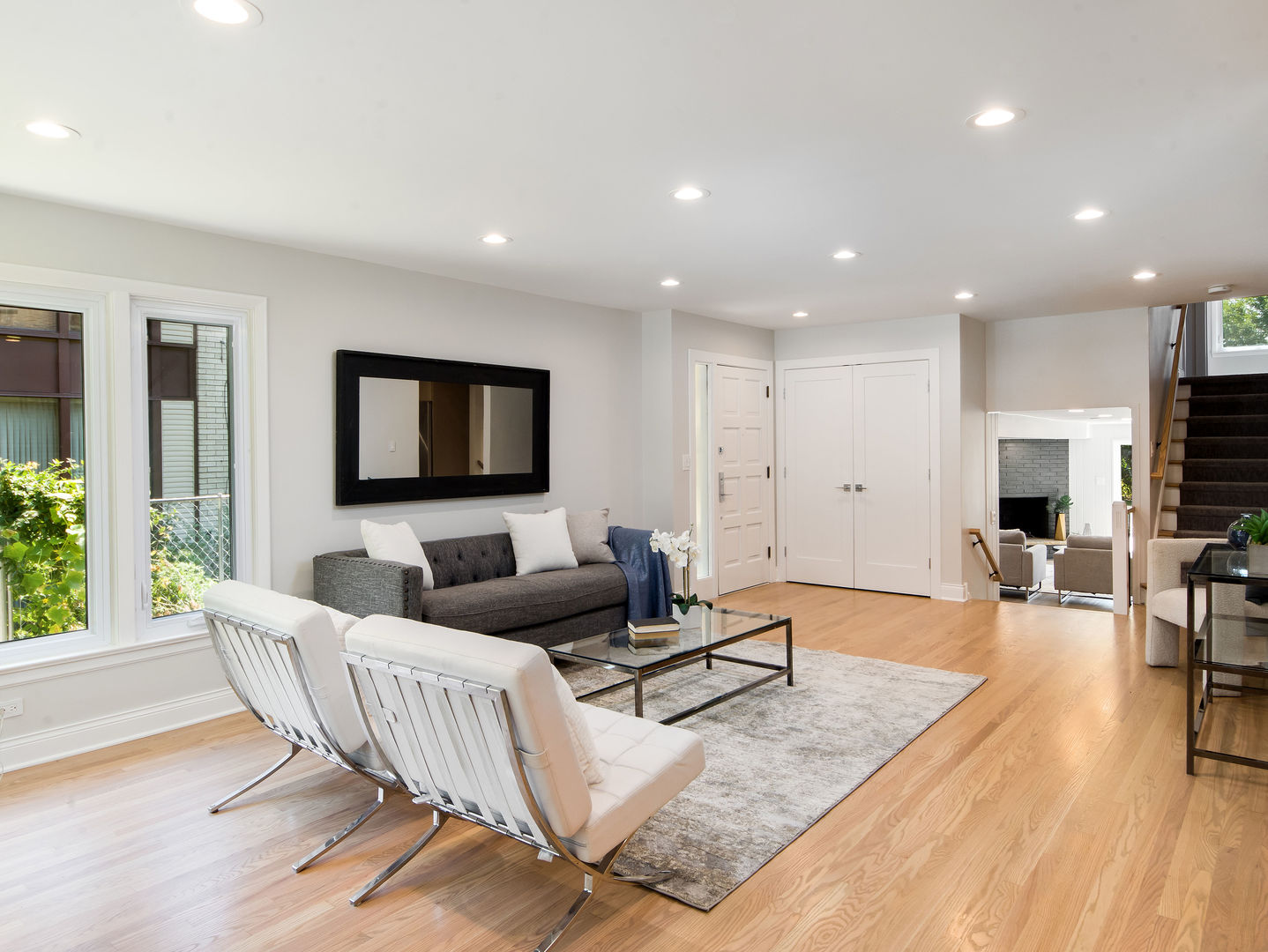 4343 Davis Street Skokie, IL 60076 - Photo 3 of 41 a living room with furniture and a flat screen tv