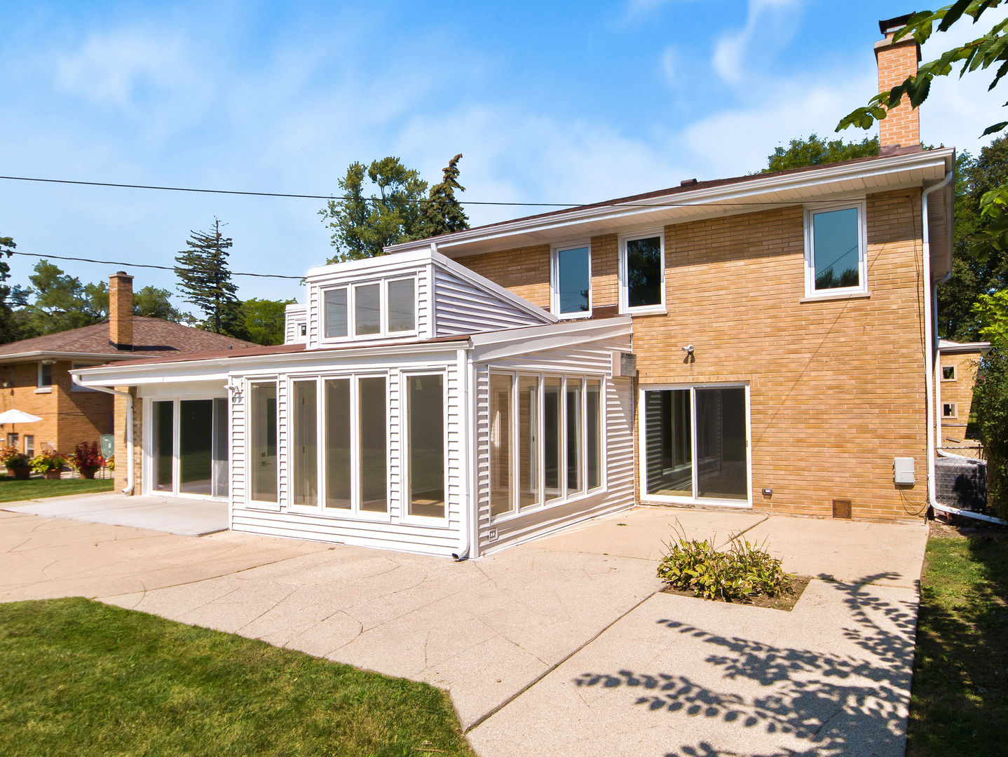 4343 Davis Street Skokie, IL 60076 - Photo 35 of 41 a front view of a house with a yard