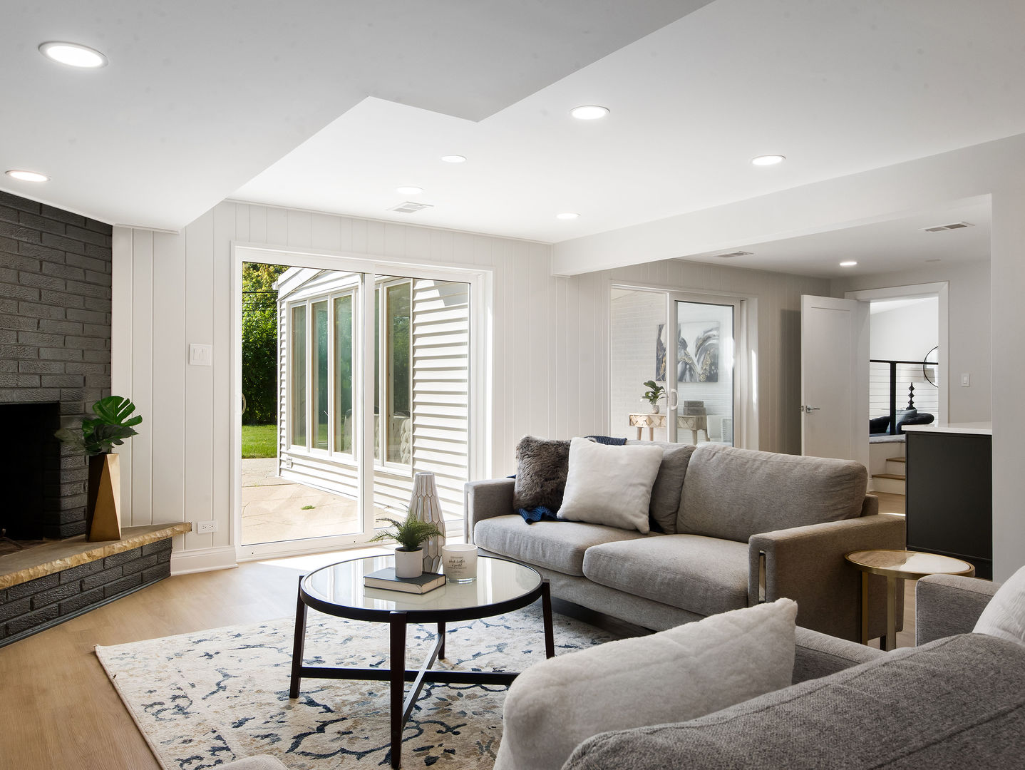 4343 Davis Street Skokie, IL 60076 - Photo 10 of 41 a living room with furniture and a fireplace