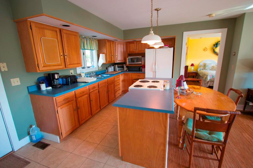 320 Paradise Road Bethel, ME 04217 - Photo 25 of 31 Ample sized kitchen in the in-law...