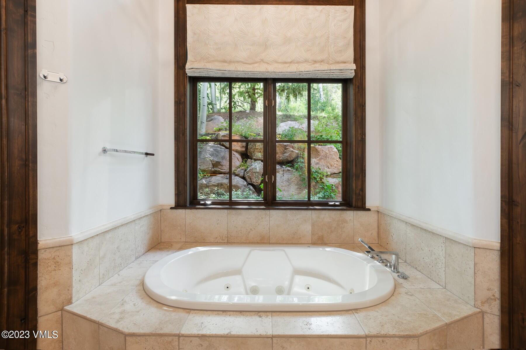941 Daybreak Ridge Road Avon, CO 81620 - Photo 15 of 29 a bathroom with a window