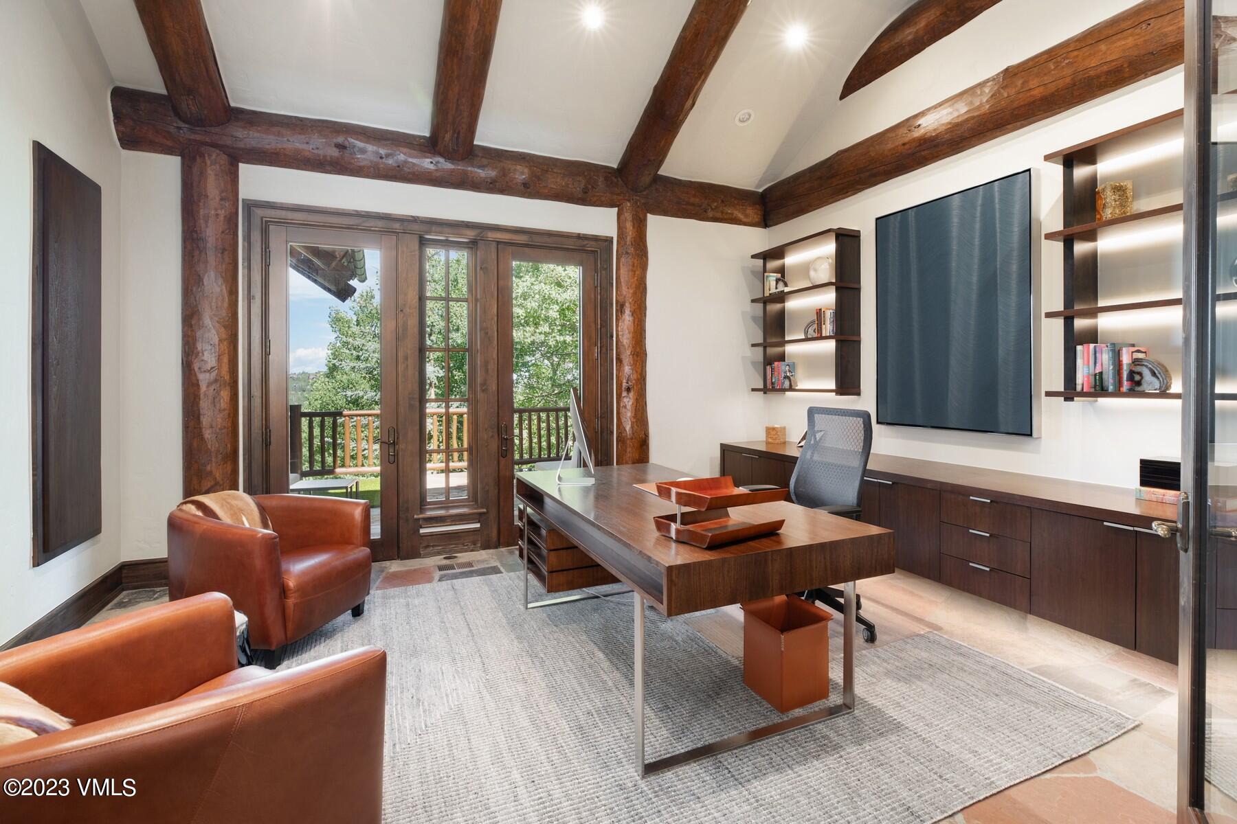 941 Daybreak Ridge Road Avon, CO 81620 - Photo 17 of 29 a reading room with furniture and large window