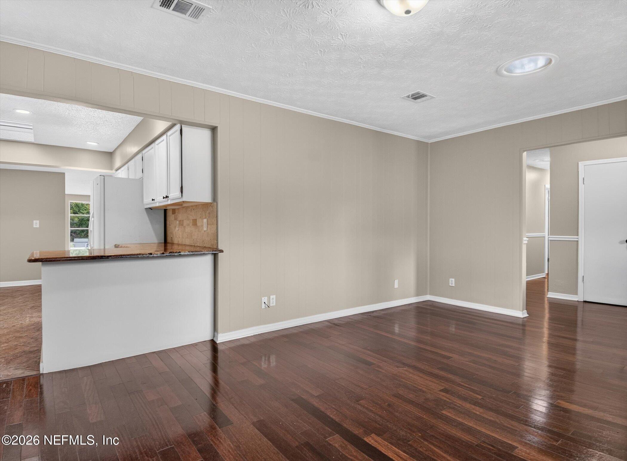 2705 Navajo Road Orange Park, FL 32073 - Photo 22 of 58 a view of a kitchen with wooden floor and a sink