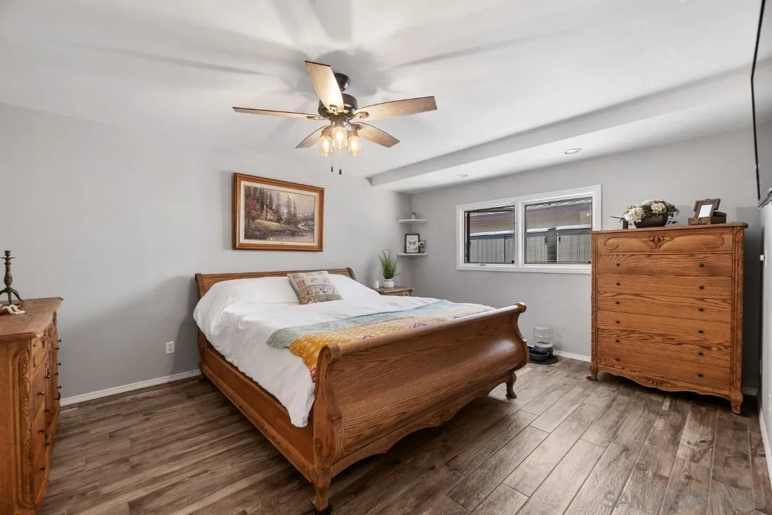 13829 Tobiasson Road Poway, CA 92064 - Photo 28 of 52 a bedroom with a bed and a dresser